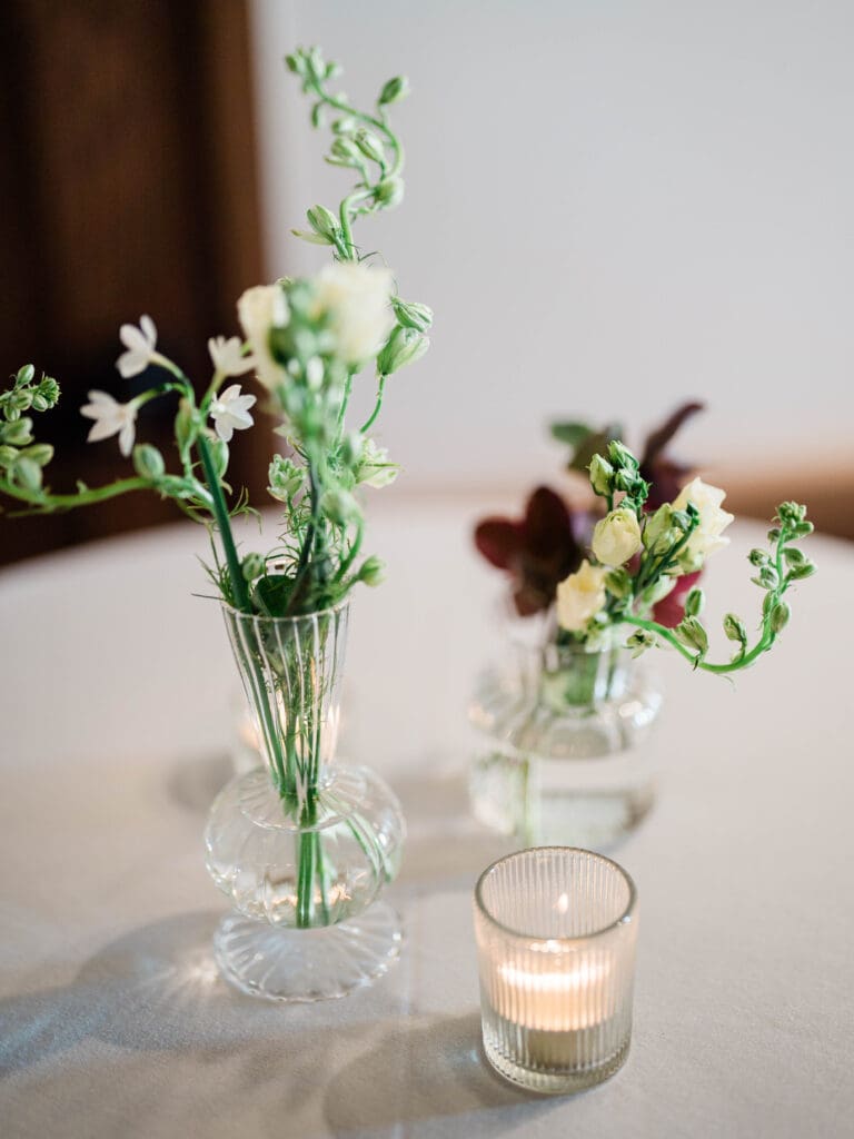 Bud vases with florals; wedding color palettes for 2026